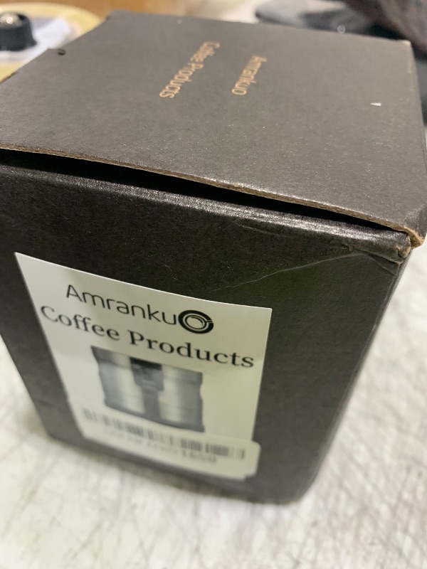 Photo 1 of AMRANKUO Portafilter Holder - Espresso Tamping Station Crafted from Solid 304 Stainless Steel for Most 58mm Portafilters with Adjustable Height Screw | Stable and Efficient Puck Preparation