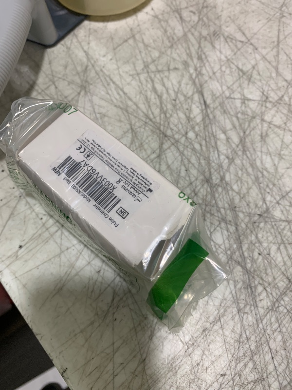 Photo 1 of Fingertip Pulse Oximeter Blood Oxygen Monitor Pulse Ox, Heart Rate and Fast Spo2 Reading Oxygen Meter with OLED Screen Included Batteries and Lanyard
