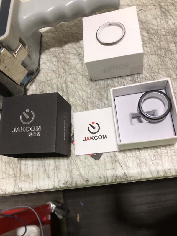 Photo 1 of JAKCOM R5 Smart Ring New Intelligent Wearable RFID Device Build-in 13.56mhz 125khz 6 RFID Cards & 128GB Wireless Disk Sharing & 2 Health Stones & Many NFC Functions for iPhone Android (L)