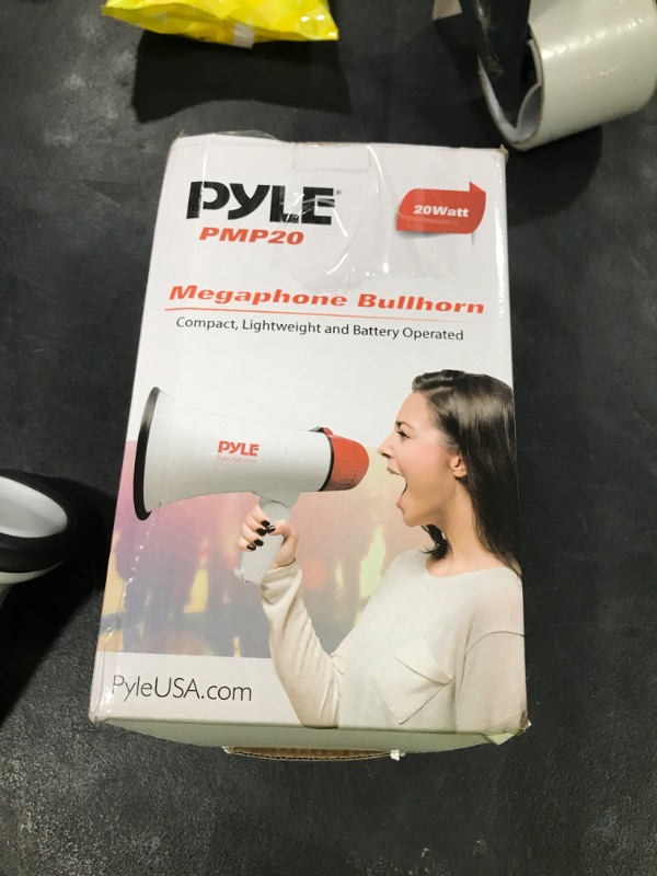 Photo 1 of Pyle 20W Megaphone Bullhorn - 5.4'' x 8.6'' Portable Megaphone, Projection Range Up to 800 Sq. Yards, Voice Talking & Siren Alert, Shoulder Strap, Battery Operated, (White)