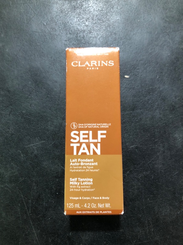 Photo 1 of Clarins Self Tanning Milky Lotion | Self Tanner For Face and Body | Natural, Long-Lasting, Streak-Free, Sun-Kissed Glow and 24-Hour Hydration* | Non-Staining | Contains Glycerin | 4.2 Ounces