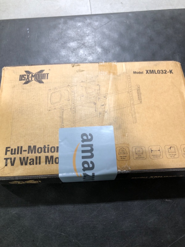 Photo 1 of Full Motion TV Wall Mount for Most 37"-84" Flat Screen TV, Swivel or Tilt TV Wall Bracket with Dual Articulating Arms, for 12"-16" Wood Studs, Max VESA 600x400mm, Load 120 lbs by USX MOUNT