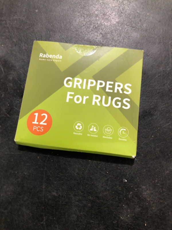 Photo 1 of Rabenda 12 Pcs Rug Tape, Non Slip Rug Pads Grippers for Hardwood Floors and Tiles, Reusable Carpet Tape for Area Rugs, Double-Sided Adhesive Rug Stickers Keep Corners Flat (Black)