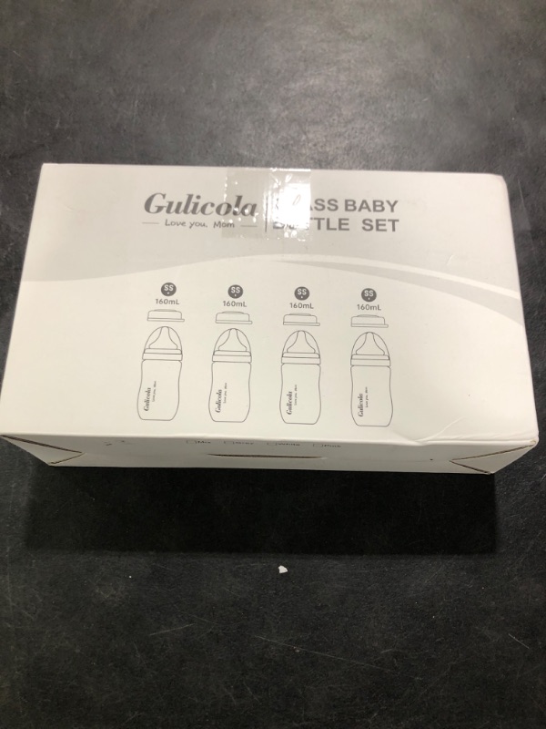 Photo 1 of Gulicola Natural Glass Baby Bottle 4 Pack, Newborn Breastfeeding Bottles Set, Extra Slow Flow Nipples (SS), Anti Colic, 0 Months+, 5 oz - White