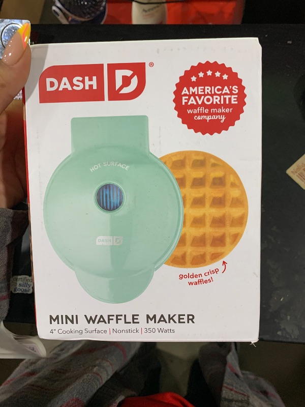 Photo 1 of DASH Mini Waffle Maker - 4” Waffle Mold, Nonstick Waffle Iron with Quick Heat-Up, PTFE Nonstick Surface - Perfect Mini Waffle Maker for Kids and Families, Just Add Batter (Aqua)