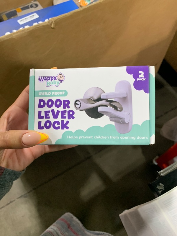 Photo 1 of Door Lever Lock (2 Pack) – Prevents Toddlers from Opening Doors – Easy One-Hand Operation for Adults – Durable ABS with 3M Adhesive Backing – No Tools Needed for Install