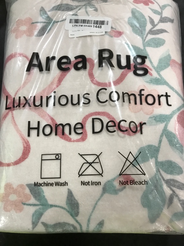 Photo 1 of Collive 3x5 Nursery Rug, Boho Pink Floral Area Rugs Machine Washable, Soft Ultra-Thin Bow Carpet Non Slip for Girls Room Bedroom Entryway Playroom Living Room (Pink, 3' X 5')