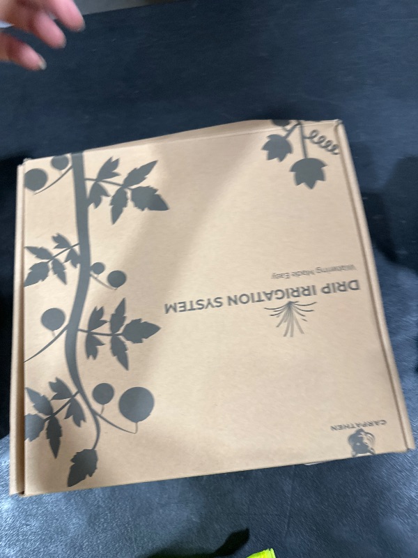 Photo 1 of CARPATHEN Drip Irrigation System - Adjustable Premium Irrigation System for Garden, Raised Beds - Complete Drip Irrigation Kit with Drip Emitters, 5/16" and 1/4" Irrigation Tubing and Barbed Fittings