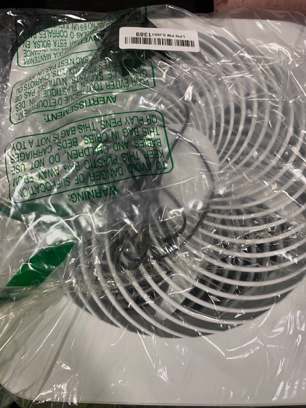 Photo 1 of Treva 10-Inch Portable Fan, Powered by Battery and/or AC Adapter - Desk Fan Air Circulating with 2 Cooling Speeds for Personal and Travel Use (White)
