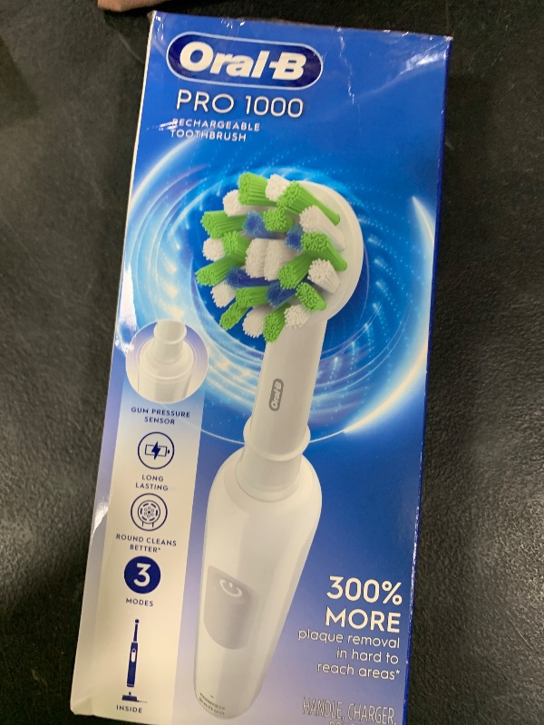 Photo 1 of Oral-B Pro 1000 Rechargeable Electric Toothbrush, White