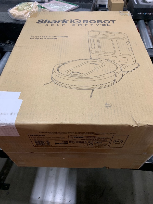 Photo 1 of Shark AV1010AE IQ Robot Vacuum with XL Self-Empty Base, Bagless, 45-Day Capacity, Advanced Navigation, Alexa & Wi-Fi, Multi-Surface Brushroll, for Pets, Dander & Dust, Carpet & Hard Floor, Black