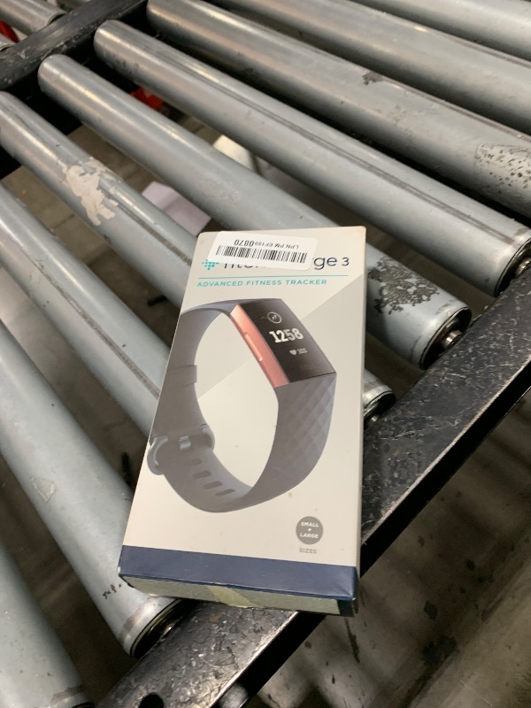 Photo 1 of Fitbit Charge 3 Fitness Activity Tracker, Rose Gold/Blue Grey, One Size (S and L Bands Included)
