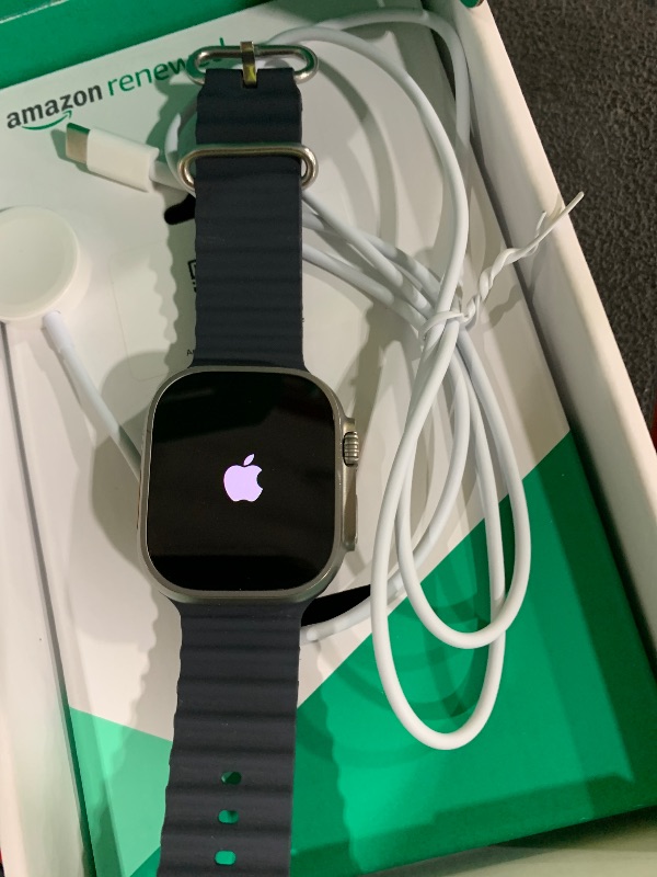 Photo 1 of Apple Watch Ultra [GPS + Cellular 49mm] Titanium Case with Midnight Ocean Band, One Size (Renewed Premium)