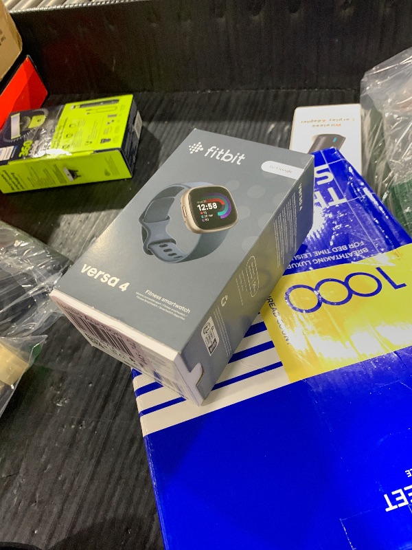 Photo 1 of Fitbit Versa 4 Fitness Smartwatch with Daily Readiness, GPS, 24/7 Heart Rate, 40+ Exercise Modes, Sleep Tracking and more, Waterfall Blue/Platinum, One Size (S & L Bands Included)