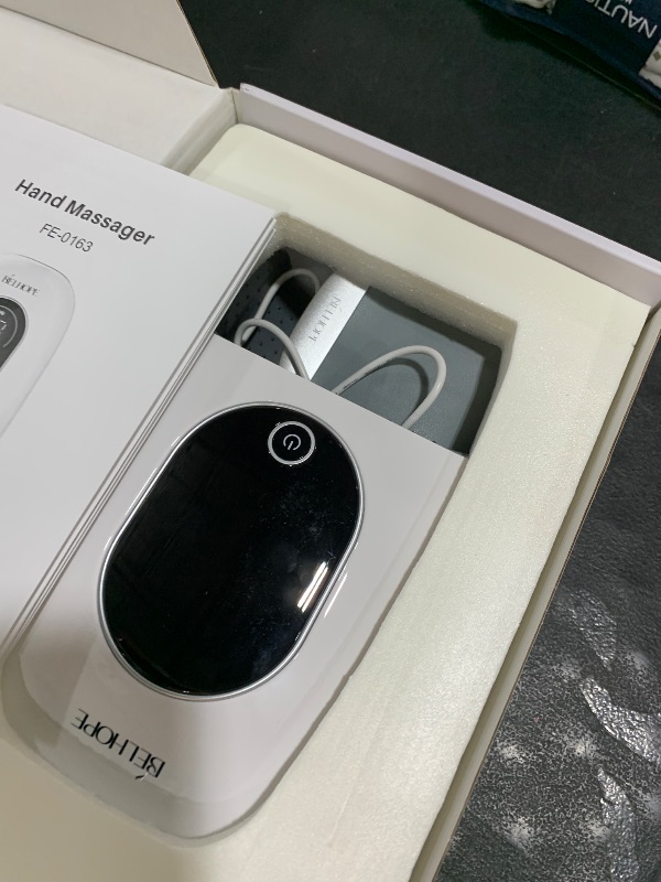 Photo 1 of Hand Massager with 9 Modes and 4 Heating Options for Hot and Cold Therapy Hand and Wrist Massager for Arthritis and Carpal Tunnel Relief, Hand Massager with Heat and Compression, White