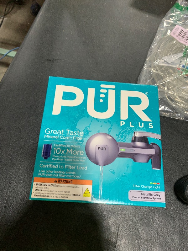 Photo 1 of PUR PLUS Horizontal Faucet Mount Water Filtration System with 3-in-1 Lead Reducing Filter for Great-Tasting Filtered Tap Water, Lasts 100 Gallons, Fits Most Kitchen or Bathroom Faucets, Metallic Grey