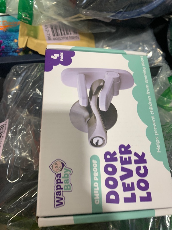Photo 1 of Door Lever Locks (4 Pack) - Prevents Toddlers from Opening Doors - Durable ABS with 3M Adhesive - Easy One-Hand Operation for Adults, No Tools Needed