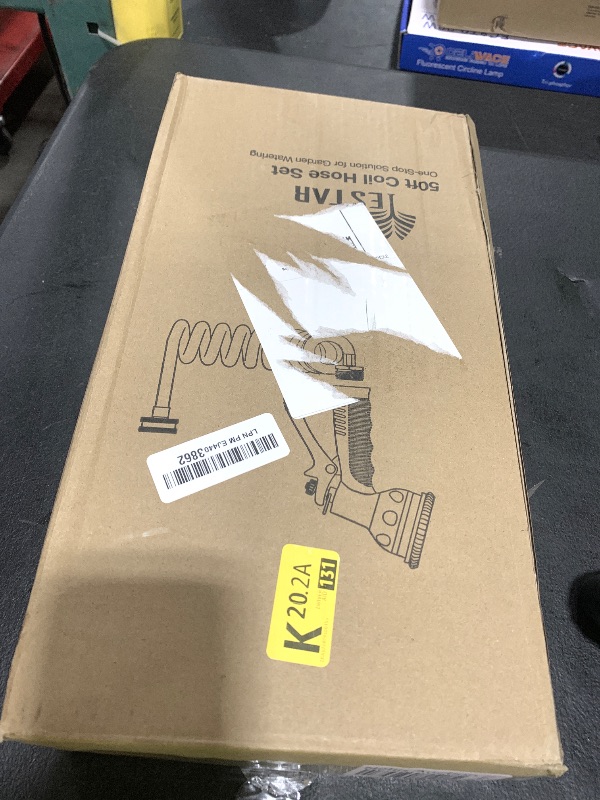 Photo 1 of Coil Hose 50FT EVA Coil Garden Hose With 3/4'' Brass Connector Coiled Water Hose Lightweight And No Kink Includes 7 Patterns Spray Nozzle For Outdoors Lawn Watering Car Washing