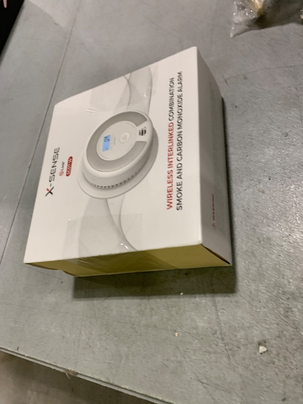 Photo 1 of X-Sense Wireless Interconnected Combination Smoke and Carbon Monoxide Detector with LCD Display & 10-Year Battery, Over 820 ft Transmission Range, 1-Pack