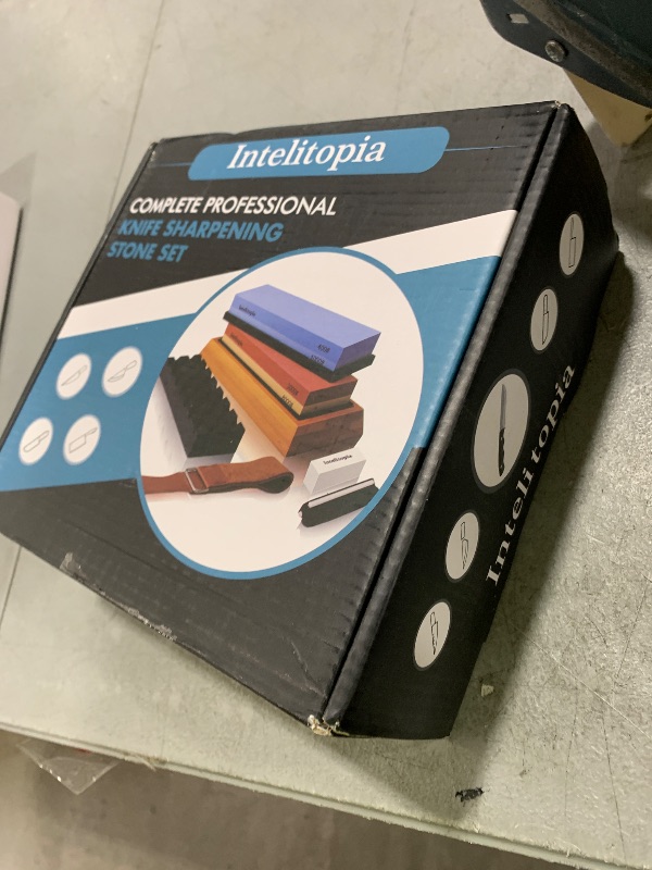 Photo 1 of Intelitopia Complete Knife Sharpening Stone Set – Dual Grit Whetstone 400/1000 3000/8000 Knife Sharpener with Leather Strop, Flattening Stone, Bamboo Base, 3 Non-slip Rubber Bases & Angle Guide