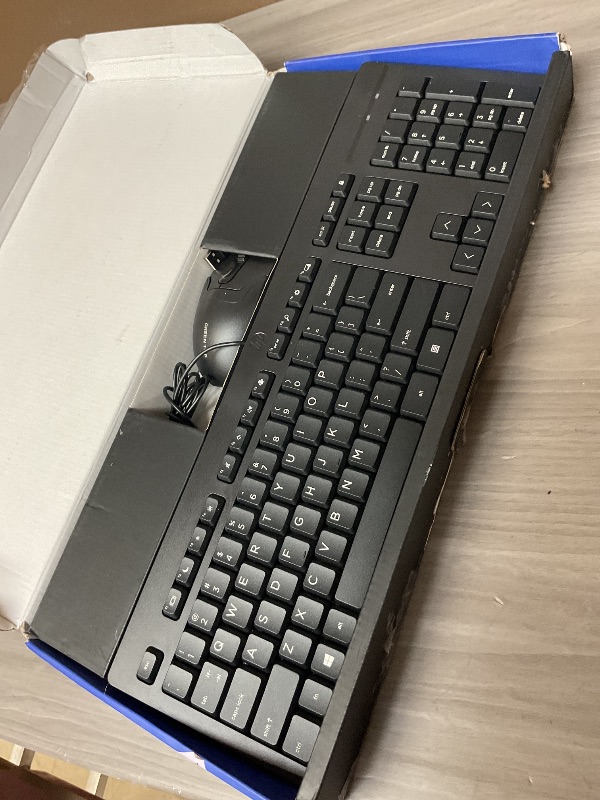 Photo 1 of Wired black keyboard and Mouse