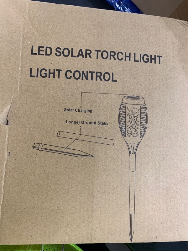 Photo 1 of Solar Outdoor Lights - 8 Pack 12 LED Solar Torch Lights with Flickering Flame for Garden Decor Updated Pathway Lighting Outdoor Waterproof Decor Lamp for Outside Yard Patio Lawn Tiki Torches