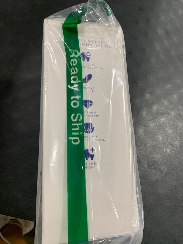 Photo 1 of Oral-B iO Deep Clean + Protect Rechargeable Electric Toothbrush, White with a iO Series 7 Toothbrush, 2 Replacement Brush Heads, and a Charging Travel Case