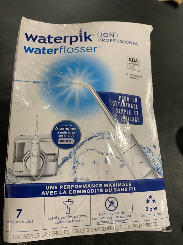 Photo 1 of Waterpik ION Professional Water Flosser, Rechargeable and Portable for Teeth, Gums, Braces, 10 Settings, 7 Flossing Tips For Multiple Users And Needs, ADA Accepted, WF-12 White, Packaging May Vary