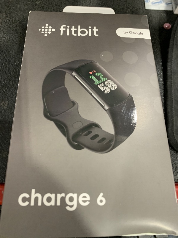 Photo 1 of Fitbit Charge 6 Fitness Tracker with Google apps, Heart Rate on Exercise Equipment, 6-Months Premium Membership Included, GPS, Health Tools and More, Obsidian/Black, One Size (S & L Bands Included)