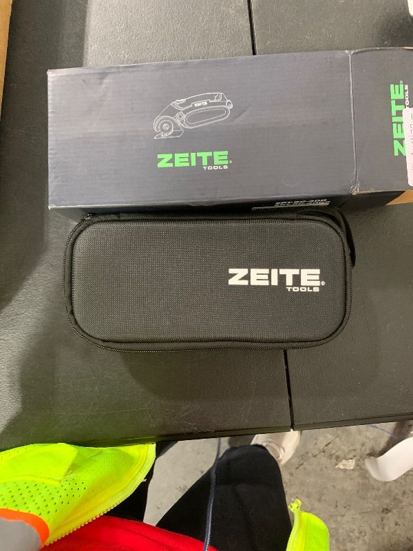 Photo 1 of ITEM IS MISSING PARTS UNSURE WHAT PARTS ----------------------------------------------- ZEITE 4V Cordless Electric Scissors,Cardboard Cutter with 2 Blades,Storage Box,USB Charging Cable,Power Rotary Cutter,Max Cutting 1/4",for Cardboard Box,Thin Carpet & 