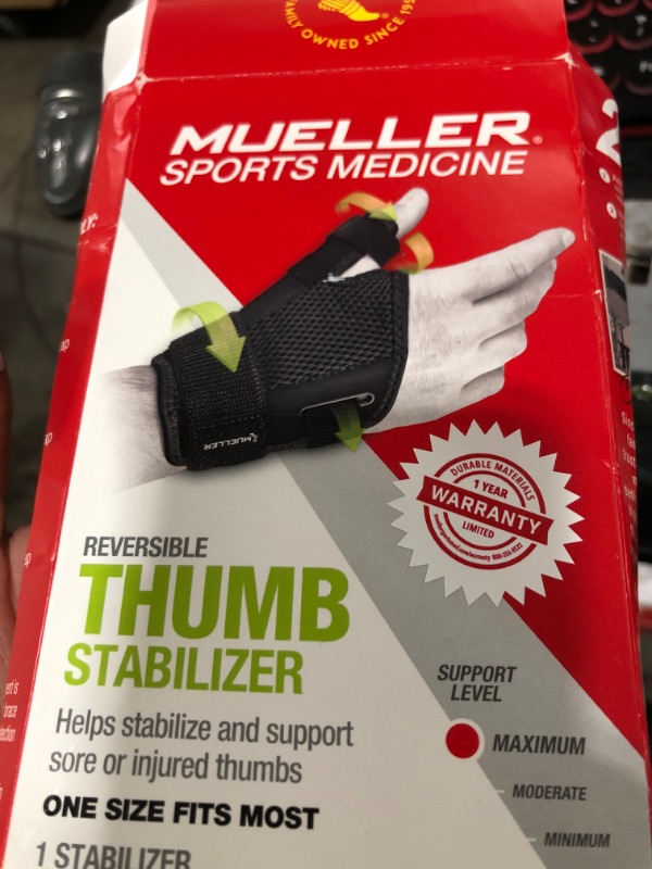 Photo 1 of MUELLER Sports Medicine Adjust-to-Fit Thumb Brace, Spica Splint, Thumb Pain Relief Stabilizer for Men and Women, Ideal for De Quervain's Tenosynovitis, Arthritis, Sprains, Fits Right or Left, Black, One Size
