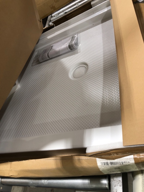 Photo 1 of DreamLine SlimLine 36 in. D x 54 in. W x 2 3/4 in. H Left Drain Double Threshold Shower Base in White, DLT-1036541