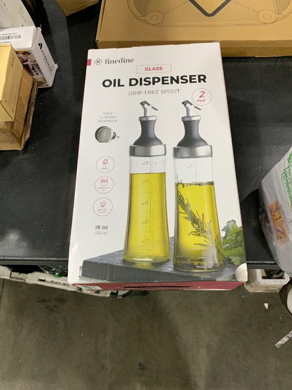Photo 1 of FineDine Superior Glass Oil and Vinegar Dispenser, Modern Olive Oil Dispenser, Wide Opening for Easy Refill and Cleaning, Clear Glass Oil Bottle, Pouring Spouts, 18 Oz. Cruet Set (Set of 2)