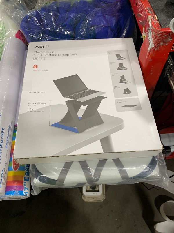 Photo 1 of MOFT Folding Laptop Stand Lap Desk, Portable & Mini Computer Stand Laptop Desk for Travel and Home Office, Ergonomic Design with Adjustable Viewing Angles, Lightweight Computer Cooling Riser, Gray