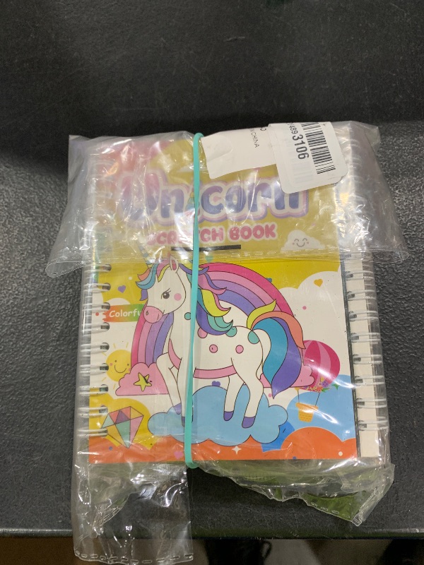 Photo 1 of SNLN Unicorn Party Favors Birthday Supplies Rainbow Scratch Art Paper Unicorn Figurines Caketopper Drawing Stencils, Unicorns Birthday Party Favors Gift for Girls Birthday Decorations