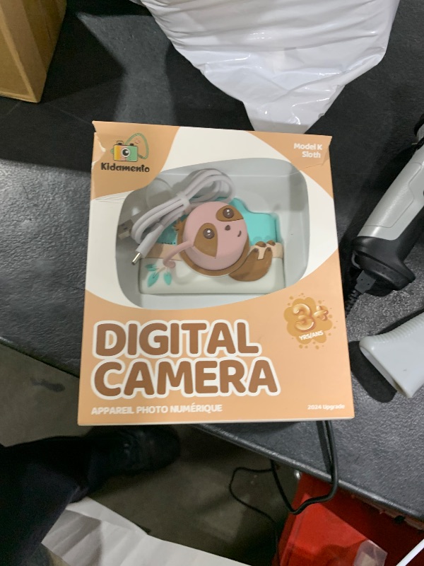 Photo 1 of Kidamento Kids Digital Camera & Video Camcorder with Touchscreen, Soft Silicone Casing, Detachable Lens Cap, 32GB Memory Card - Model K Zippy The Sloth