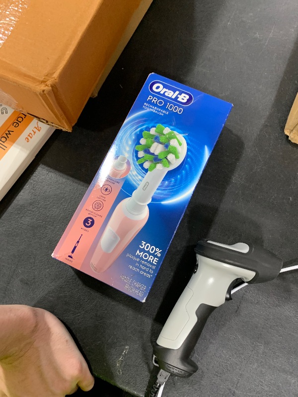 Photo 1 of Oral-B Pro 1000 Rechargeable Electric Toothbrush, Pink