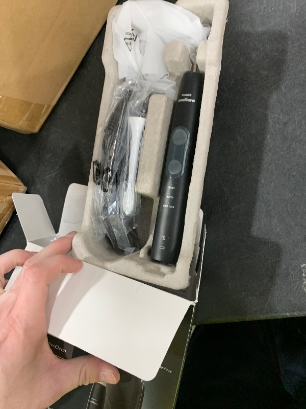 Photo 1 of Philips Sonicare ProtectiveClean 5300 Rechargeable Electric Toothbrush, with Pressure Sensor, 3 Cleaning Modes, SmarTimer and QuadPacer, with 2 Bonus Brush Heads, Travel Case, Black, Model HX6423/34