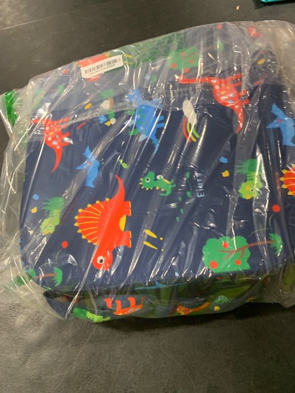 Photo 1 of Eiury Toddler Booster Seat for Dining Table, Portable Kids Booster Seat with Safety Buckles Portable Increasing Booster Cushion with Non-Slip Bottom (Blue Dinosaur)