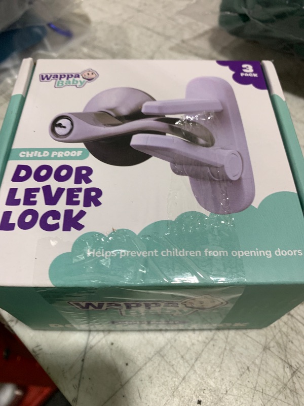 Photo 1 of Door Lever Lock (3 Pack) Prevents Toddlers from Opening Doors. 3.25" L * 1.5" W * 4.5" H Easy One Hand Operation for Adults. Durable ABS with 3M Adhesive Backing. Simple Install, No Tools Needed.