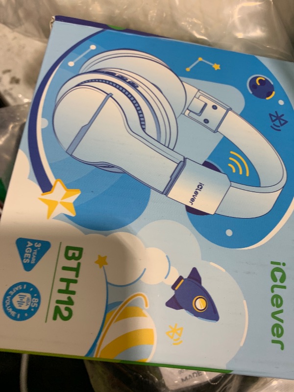 Photo 1 of iClever BTH12 Kids Bluetooth Headphones,Colorful LED Lights Kids Headphones Wireless,74/85dBA Safe Volume,85H Playtime,Fast Charging,Bluetooth 5.2,Over Ear,Built-in Mic for iPad/Tablet/Airplane,Blue
