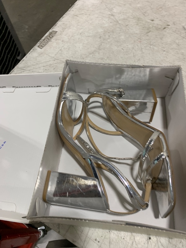 Photo 1 of Calvin Klein Women's Sassa Heeled Sandal, Silver Mirror Metallic 040, 8