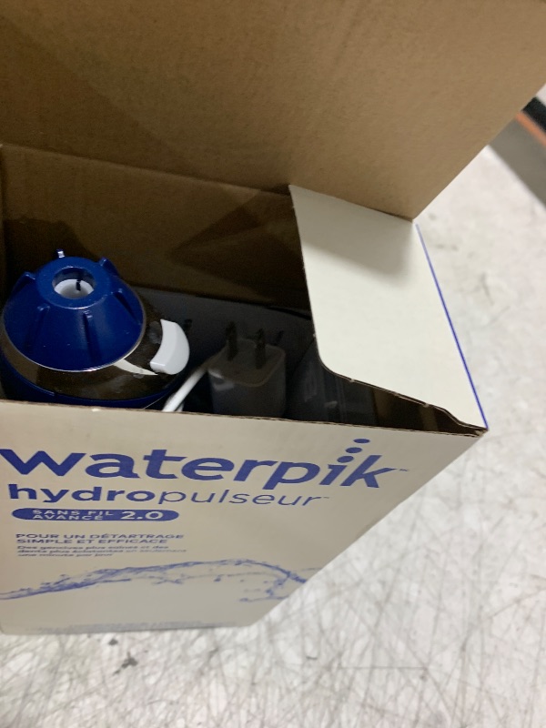 Photo 1 of Waterpik Cordless Advanced 2.0 Water Flosser For Teeth, Gums, Braces, Dental Care With Travel Bag and 4 Tips, ADA Accepted, Rechargeable, Portable, and Waterproof, Blue WP-583, Packaging May Vary