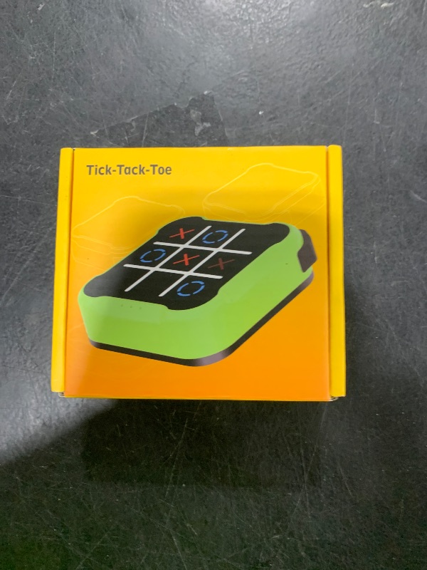 Photo 1 of Tic-Tac Toe Game for Kids: 4-in-1 Electronic Handheld Puzzle Game - Portable Sensory Toy for Kids Age 6-12 Years Old Travel School Family Fun - Birthdays Gift for Boys Girls