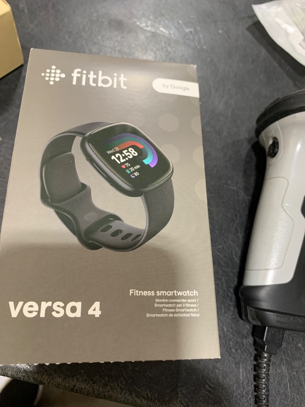 Photo 1 of Fitbit Versa 4 Fitness Smartwatch with Daily Readiness, GPS, 24/7 Heart Rate, 40+ Exercise Modes, Sleep Tracking and more, Black/Graphite, One Size (S & L Bands Included)