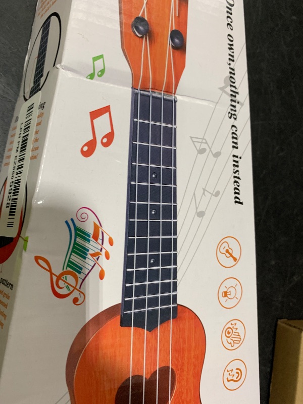 Photo 1 of YEZI Kids Toy Classical Ukulele Guitar Musical Instrument, Brown