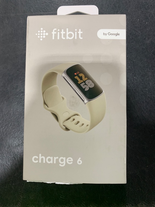 Photo 1 of Fitbit Charge 6 Fitness Tracker with Google apps, Heart Rate on Exercise Equipment, 6-Months Premium Membership Included, GPS, Health Tools and More, Porcelain/Silver, One Size (S & L Bands Included)