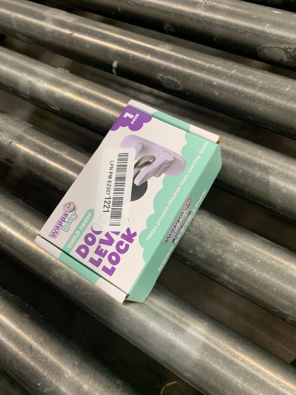 Photo 1 of Door Lever Lock (1 Pack) Prevents Toddlers from Opening Doors. 3.25" L * 1.5" W * 4.5" H Easy One Hand Operation for Adults. Durable ABS with 3M Adhesive Backing. Simple Install, No Tools Needed.