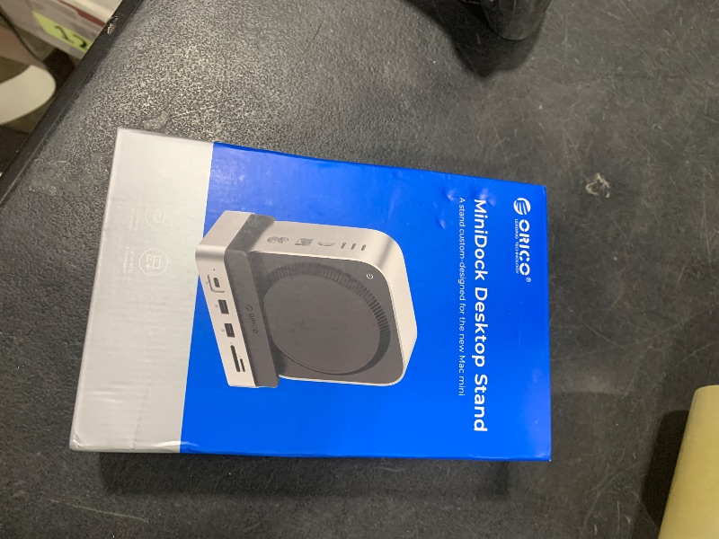 Photo 1 of ORICO MiniDock and Stand Compatibility with Mac Mini M4, 9-in-1 Aluminum Hub with 2TB NVMe M.2 SSD, 10Gbps USB-C & USB-A, 4K HDMI, Gigabit Ethernet, SD/TF Card Readers