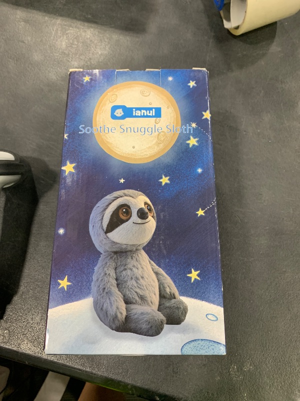 Photo 1 of ianul Breathing Stuffed Animal,Soothing Stuffed Animal for Anxiety Relief with Realistic Breathing Motion, Calming Music, Gentle Lights,Machine Washable,Ideal for Baby Adult and Relaxation (Sloth)